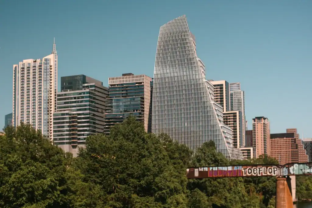 Kayle Kaupanger Austin, Texas Cityscape for CitizenM Hotels Austin, Texas city skyline with unique skyscraper and green park foreground photography by Kayle Kaupanger for CitizenM Hotels location openings